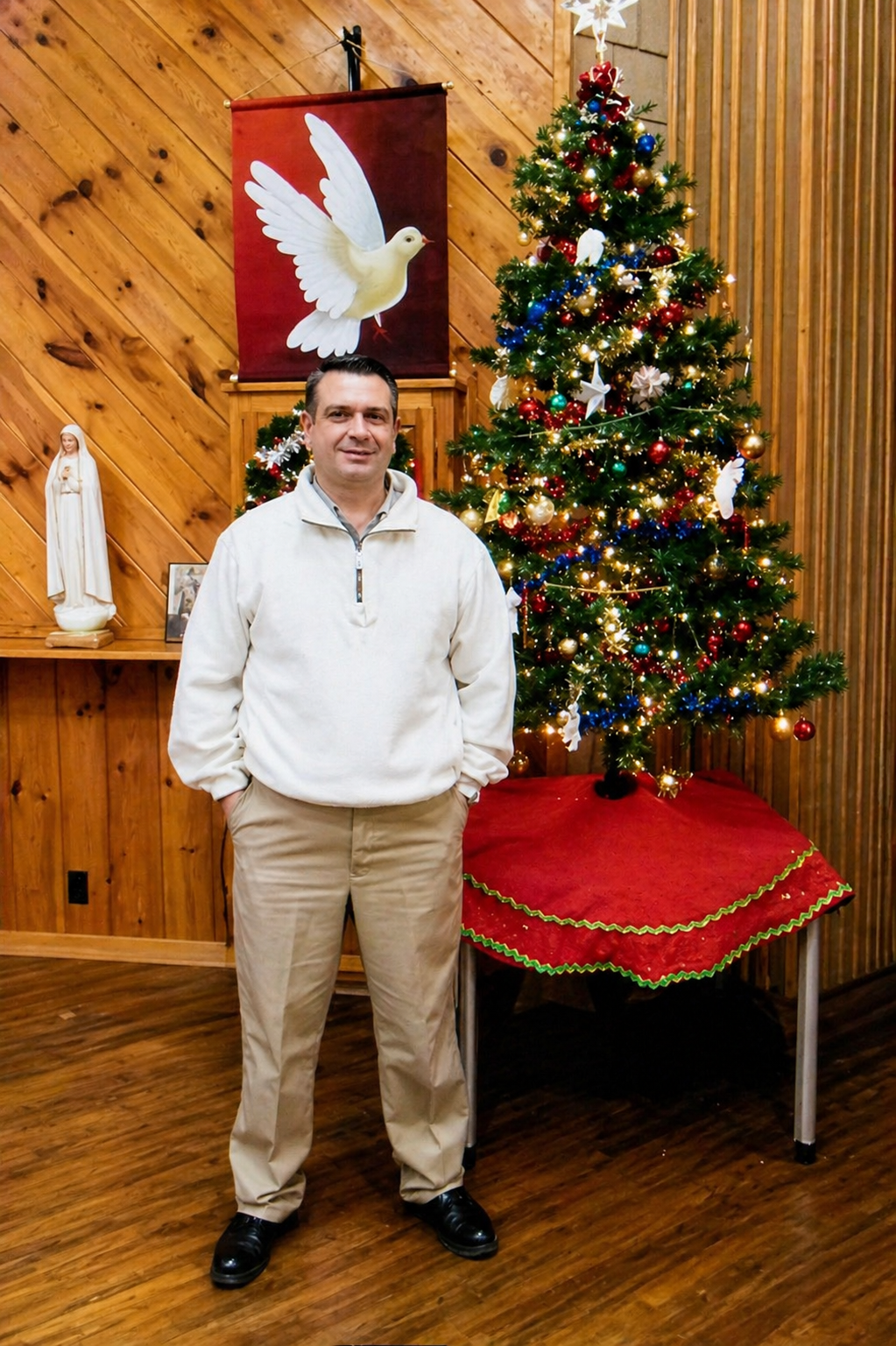 Community member by Christmas tree